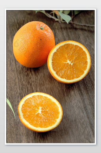 新鲜水果橙子横切面摄影图图片