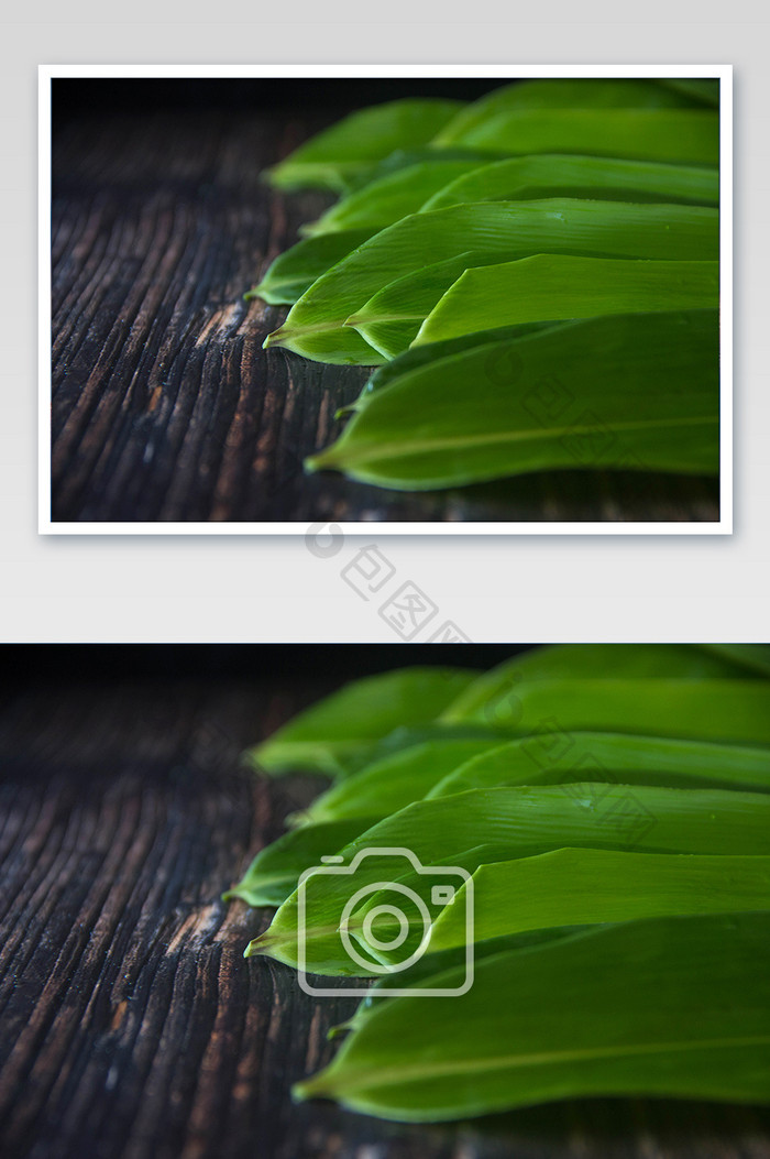 端午节包粽子新鲜粽叶摄影图