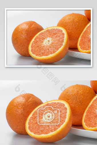 新鲜切开橙子果肉摄影图片