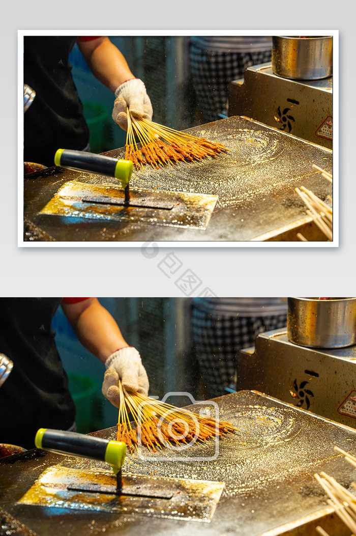 美味香辣铁板烧烤肠鸭肠摄影图图片