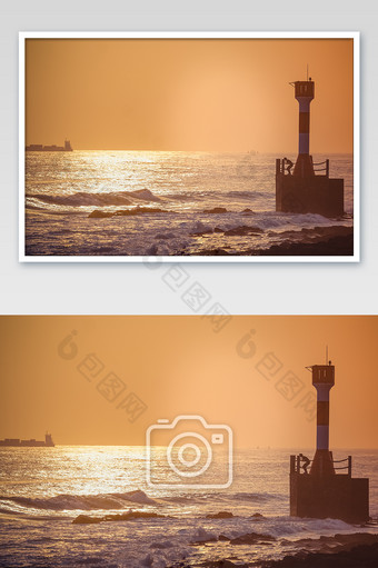 黄昏夕阳下的灯塔海浪游轮图片