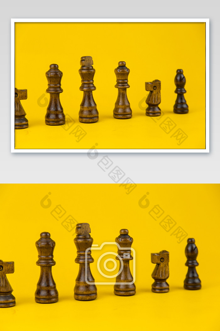 黑底的棋盘的国际象棋摆拍摄影图片