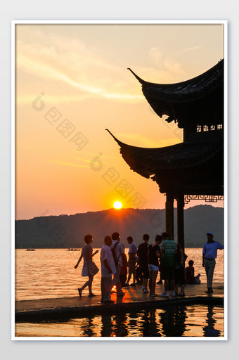 杭州西湖美景黄昏日落中式建筑摄影图图片