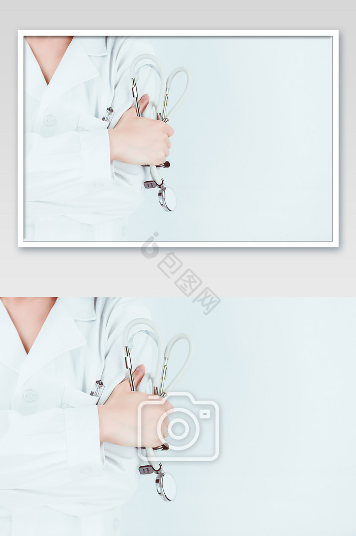 医护人员手拿听诊器抱肩动作背景图片