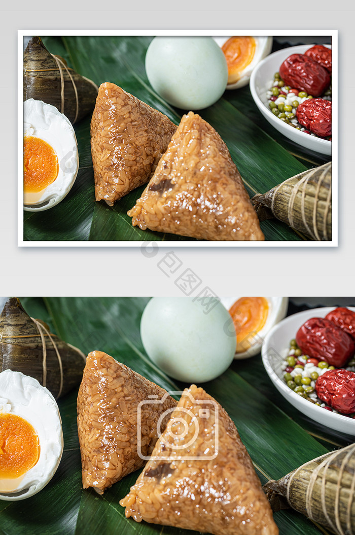 粽叶上美味的粽子咸鸭蛋蛋黄特写摄影图片