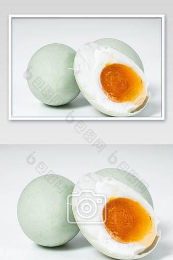 咸鸭蛋冒油蛋黄白底白色背景摄影图片