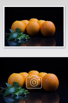 新鲜水果橙子高清黑色场景摄影图