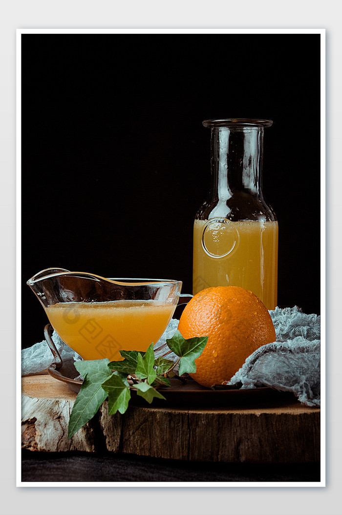 橙汁橙子鲜榨果汁摄影图片
