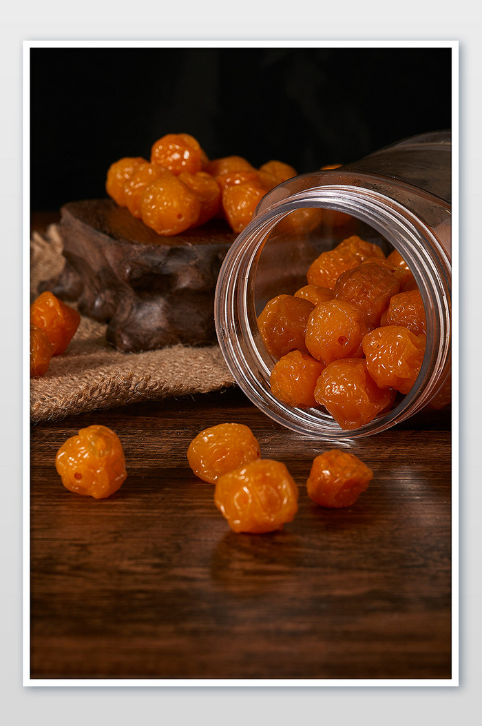 珍珠梅蜜饯零食木板果干美食摄影图片
