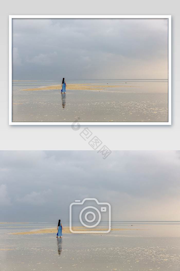 白沙滩海上美女背影摄影图片