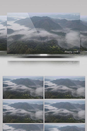 上帝视角大鸟瞰薄云海群山环绕小山村图片