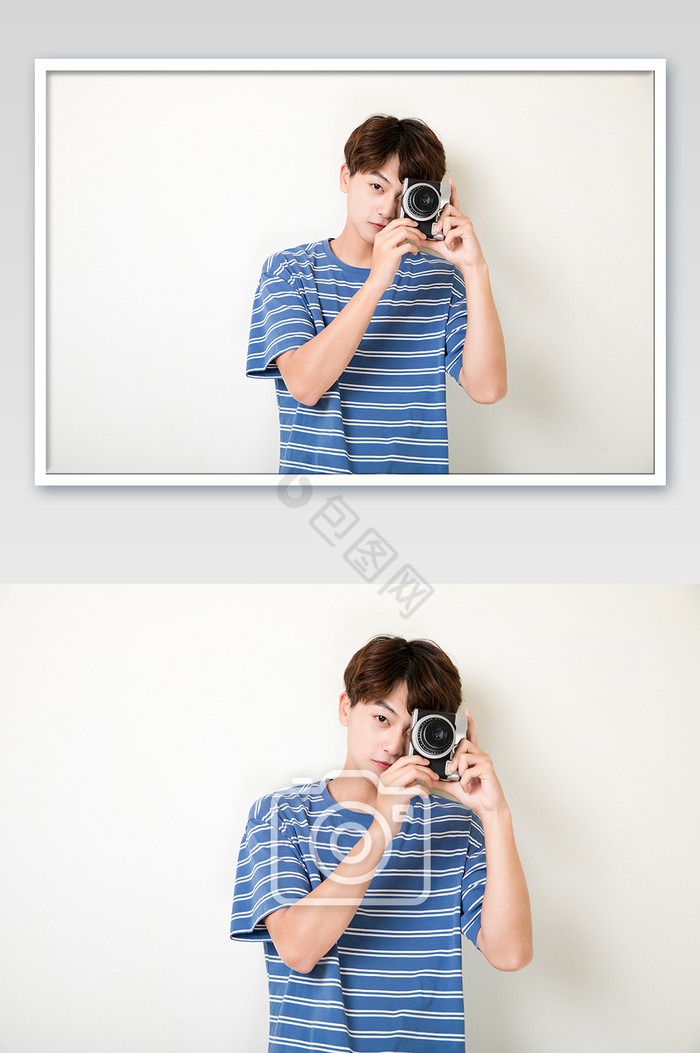 拿相机拍照的年轻男性摄影图片
