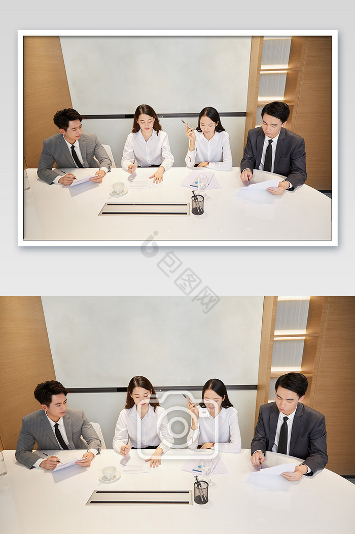 商务办公室团队办公白领会议四人看文件思考图片