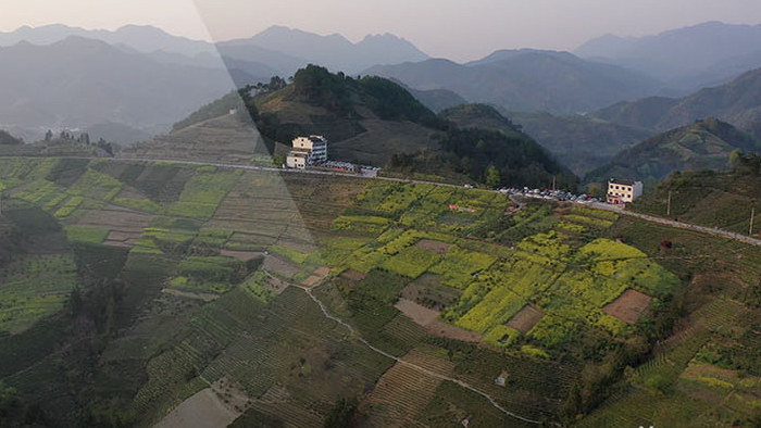 航拍大山村庄皖南盆地群山旅游视频