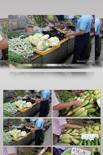 菜市场挑选蔬菜水果的市民图片