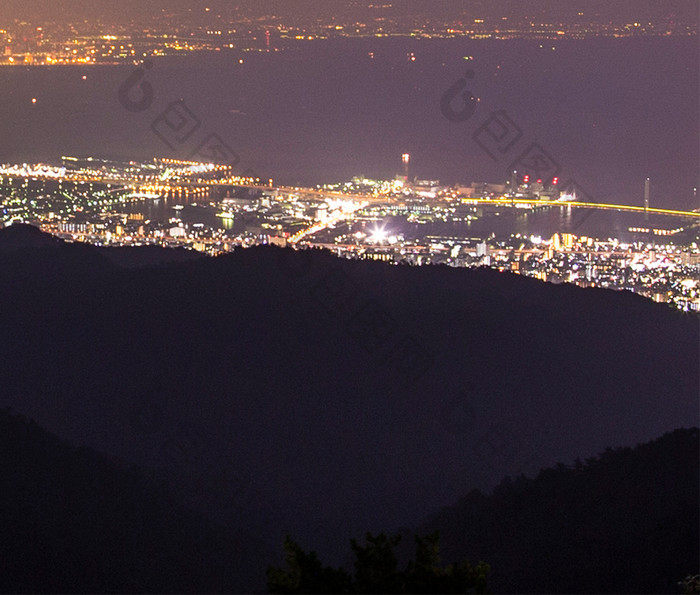 夜晚下城市远景摄影图手机壁纸