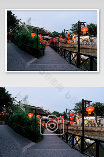 湖边古楼前红灯笼林立两侧的小道建筑摄影图图片