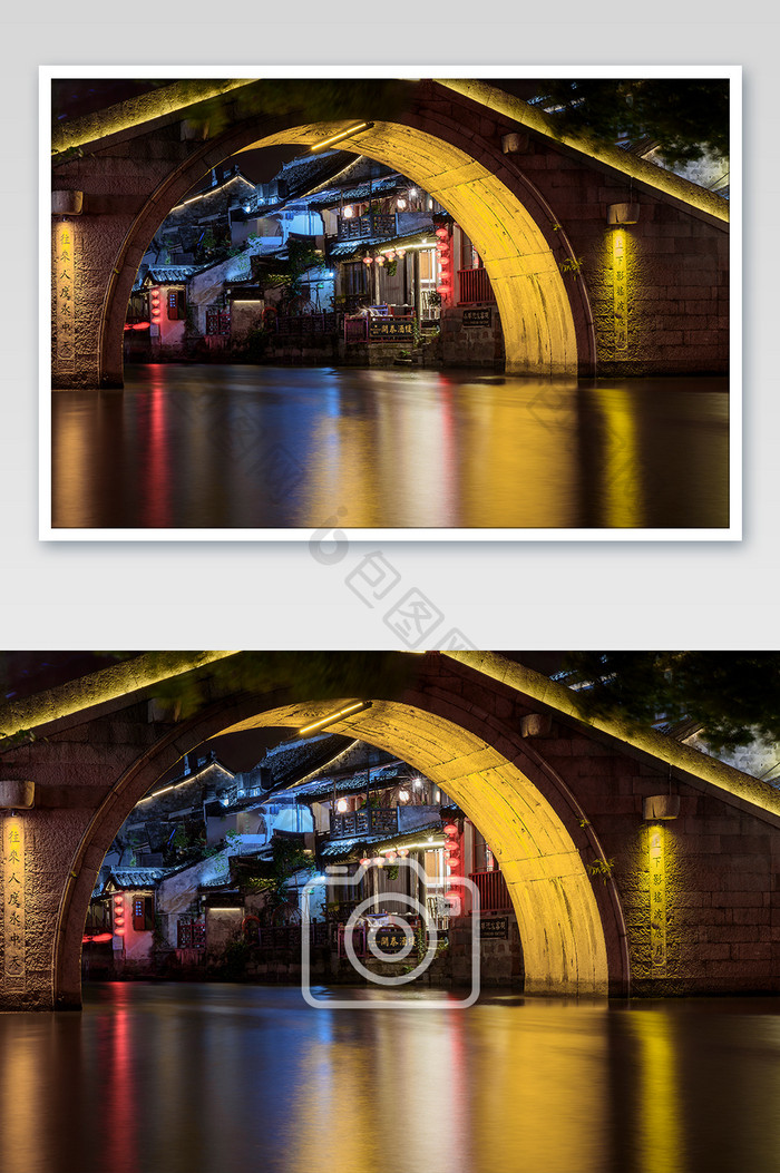水面倒映暖色小桥夜景建筑摄影图片