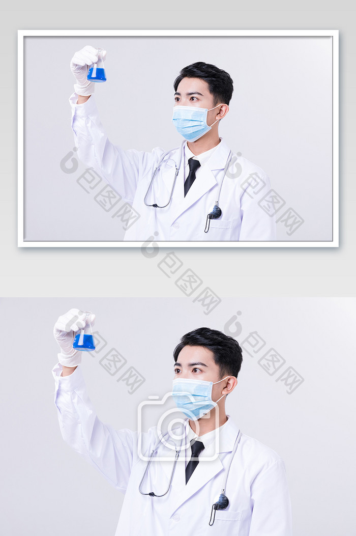 科研医疗男性手拿烧杯观察摄影图片