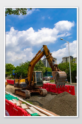 挖掘机城市道路建设机械化摄影图