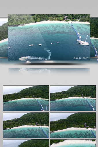 高清航拍国外海滩上的度假村划船图片