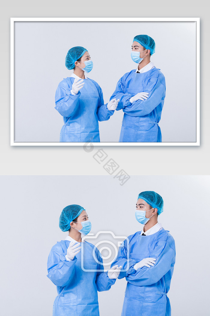 身穿蓝色手术服的医生在交流沟通图片