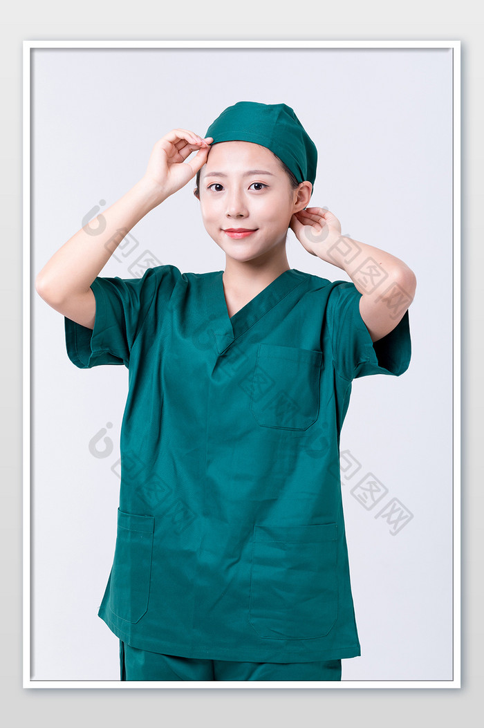 外科女医生戴手术帽摄影图片