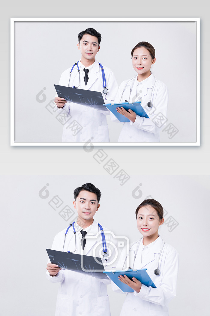 医生手拿X光片分析摄影图片图片