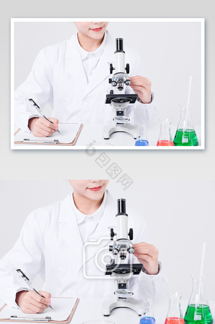 实验人员使用显微镜摄影图片