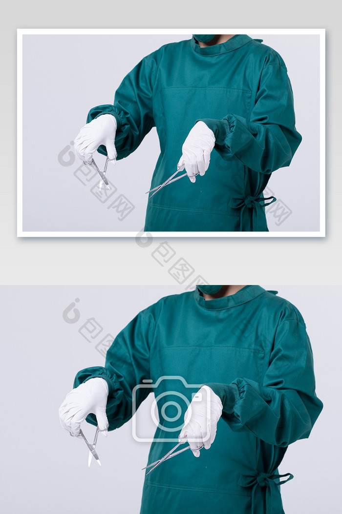 外科医生双手拿手术剪摄影图片