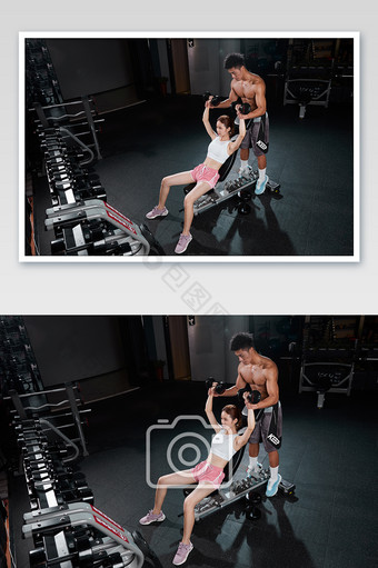 健身房运动哑铃姿势训练双人宣传图图片