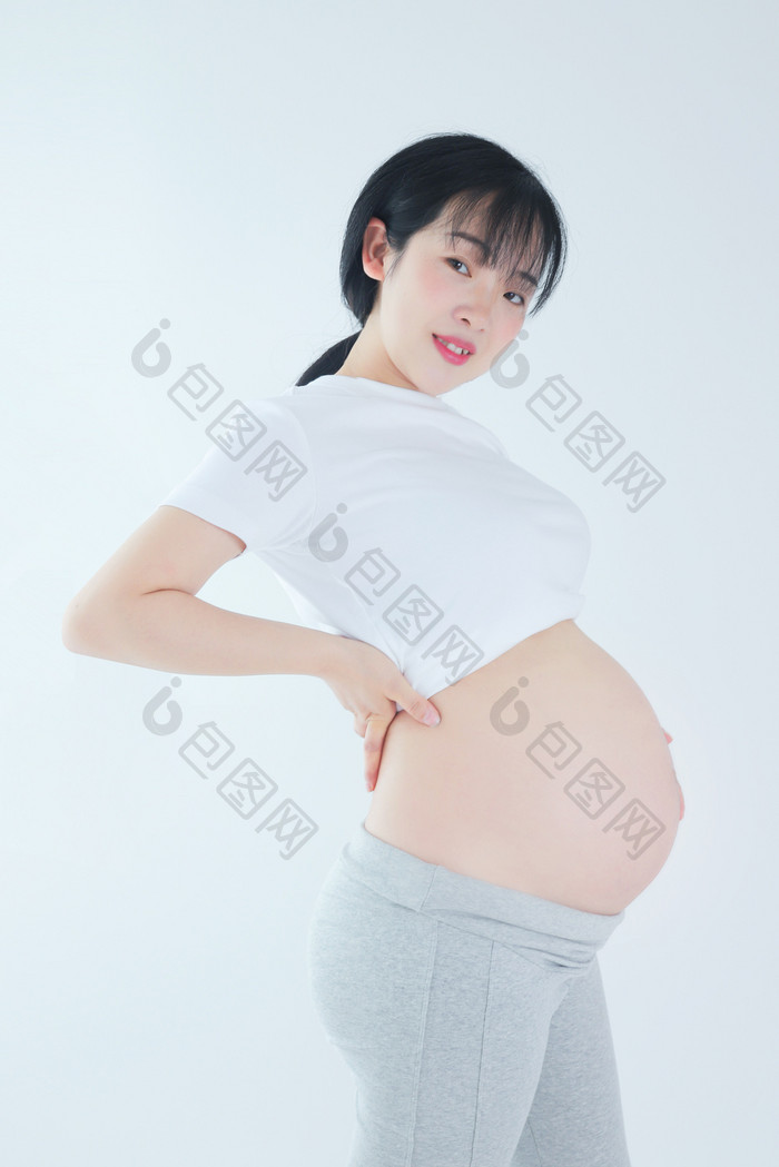 孕妇孕妇新手妈妈叉腰挺孕肚素材摄影图片