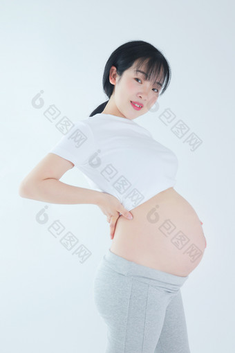 孕妇孕妇新手妈妈叉腰挺孕肚素材摄影图片