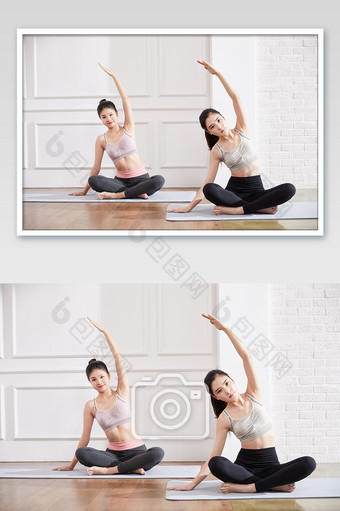 瑜伽健身普拉提女性双人瑜伽热身图片
