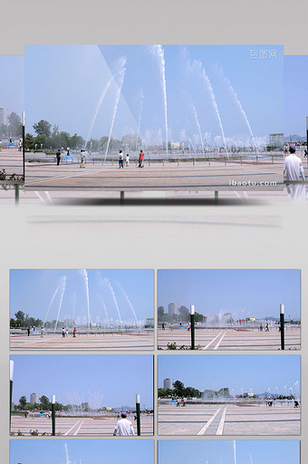 休闲广场上的大型音乐喷泉和游客图片