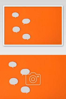 橙色背景白色对话气泡摄影图片