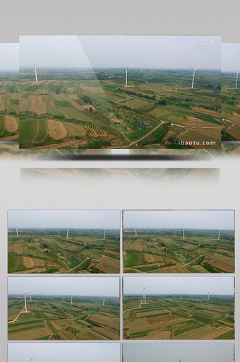 1080P原野上的风车发电图片