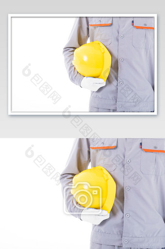 售后维修工程师手臂夹着安全帽图片