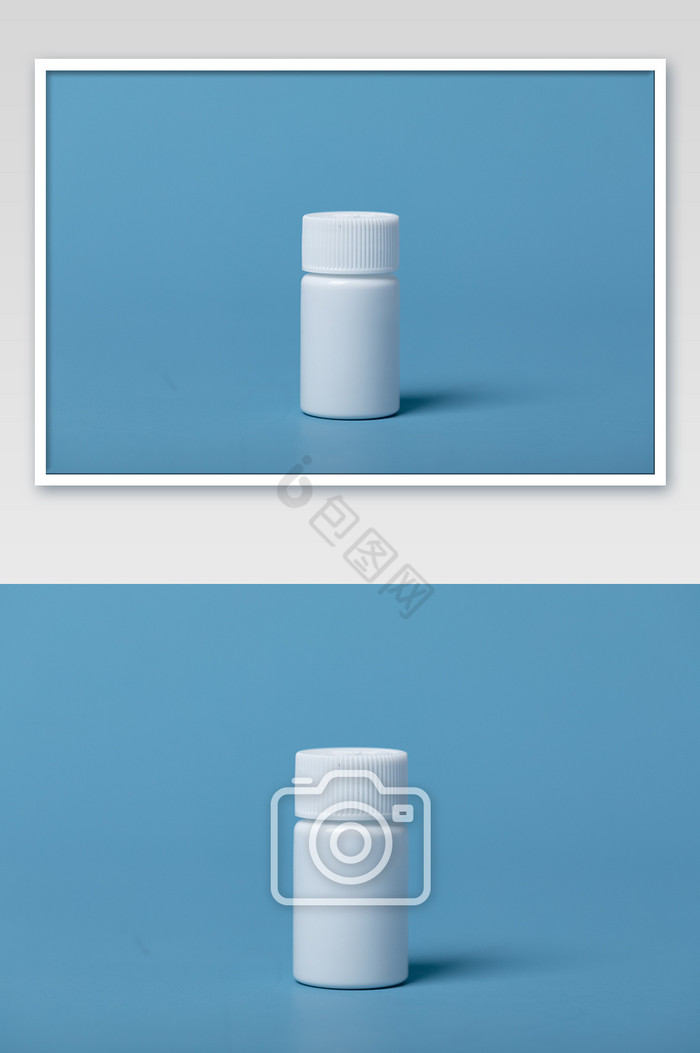 一瓶白色的药瓶在蓝色背景上图片