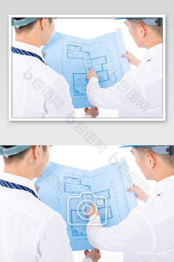 工程师拿着蓝色图纸讨论图片