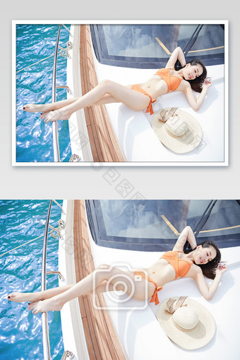 夏天海滨游艇俯拍放松平躺性感比基尼美女图片