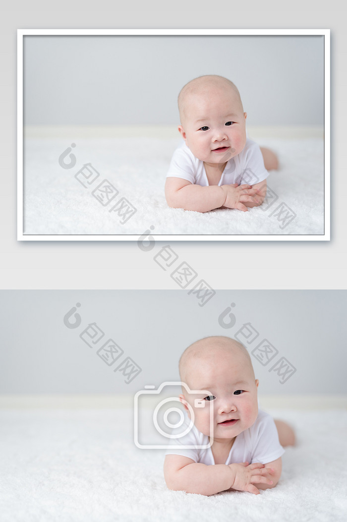 儿童母婴婴儿在垫子上趴着摄影图片