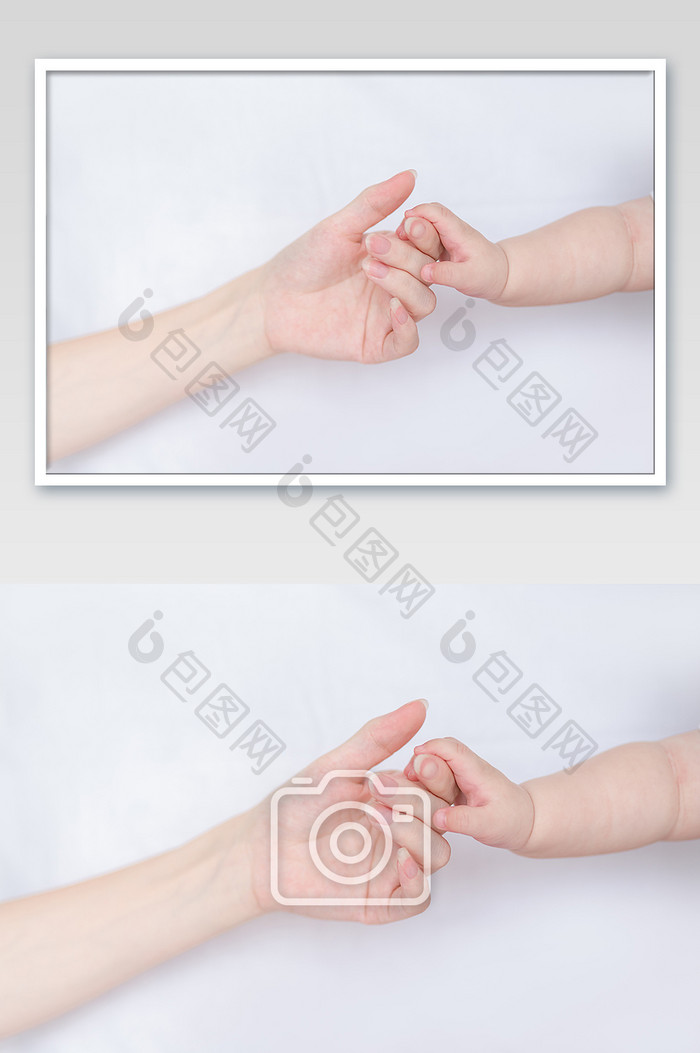 儿童母婴婴儿握住妈妈的手摄影图片