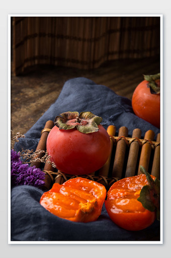 秋季水果新鲜柿子布景摄影图图片