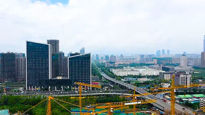 航拍南京大型建设工地脚手架高楼城市