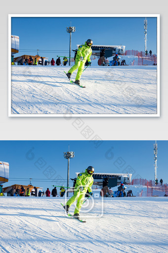 绿色衣服滑雪运动员正在滑雪图片