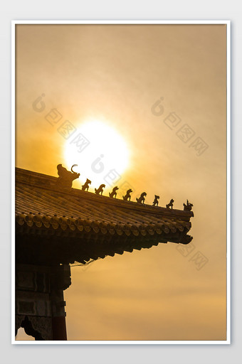 夕阳下的故宫吊脚神兽摄影图片