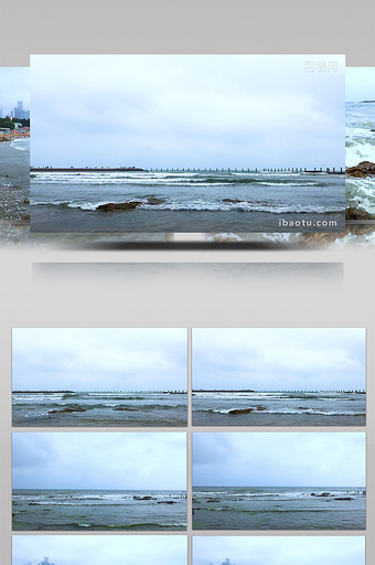 山东青岛第一海水浴场堤坝海浪沙滩游轮素材图片