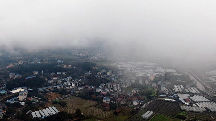 1080P航拍云雾下的村庄