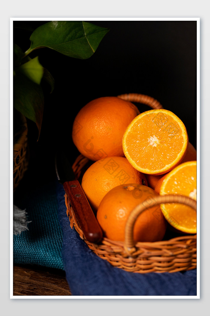 油画风格果篮橙子摄影图